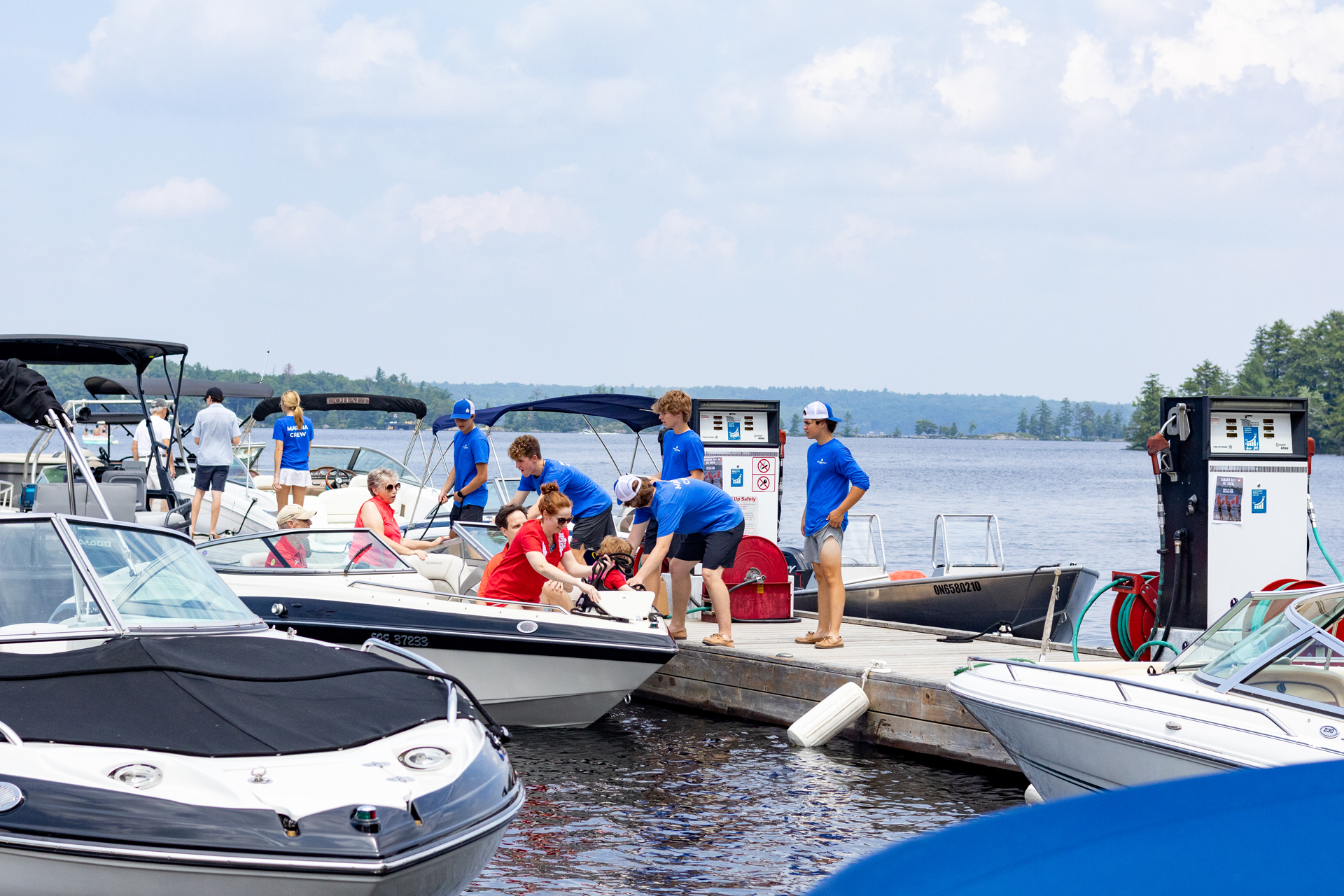 Walkers Point Marina Staff assisting boaters on Lake Muskoka near Gravenhurst Ontario