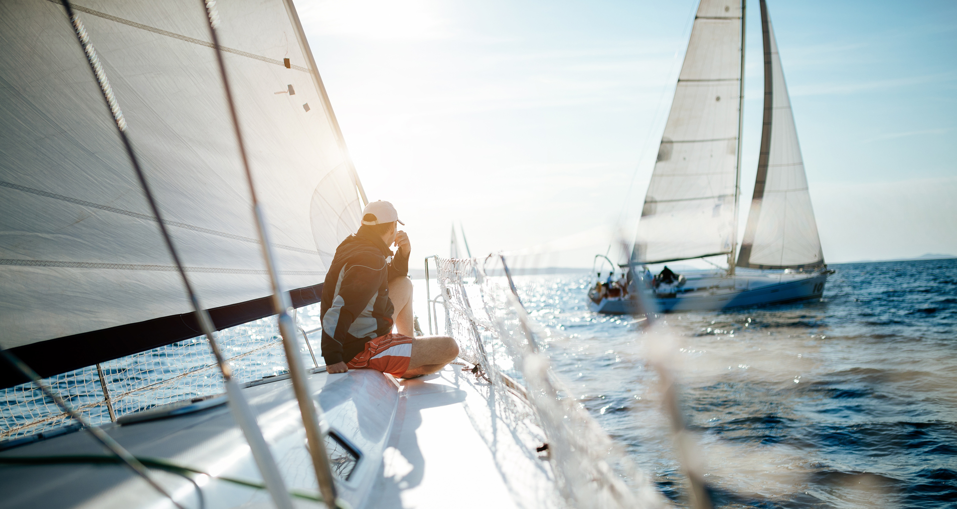 Sailor on a Sailboat with a rendezvous 